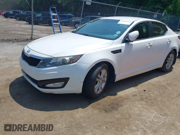 2013 Kia Optima EX z VIN 5XXGN4A70DG091603, wystawiony jako IAAI lot #42449685 z przebiegiem 167 384 mil mil oraz . Historia ofert i sprzedaży dostępna na DreamBid. Obrazek 2.