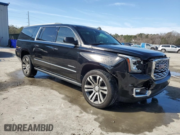 2019 GMC Yukon XL Denali with VIN 1GKS2HKJ9KR264134, listed as a Copart auction lot 43138545 with 105,690 mi miles and Salvage Title. Bid and sale history available at DreamBid. Image 4.