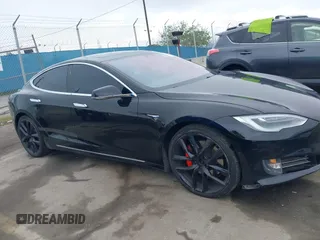 2018 Tesla Model S 75D with VIN 5YJSA1E42JF265691, listed as a IAAI auction lot 41886105 with 99,485 mi miles and . Bid and sale history available at DreamBid. Image 13.