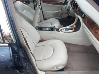 1998 Jaguar XJ Vanden Plas with VIN SAJKX6246WC832202, listed as a IAAI auction lot 41218807 with 96,589 mi miles and . Bid and sale history available at DreamBid. Image 5.