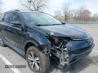 2018 Toyota RAV4 XLE with VIN 2T3RFREV0JW786393, listed as a IAAI auction lot 41997778 with 44,666 mi miles. Bid and sale history available at carsss.com. Image 6.