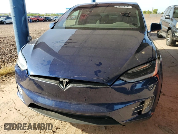 2016 Tesla Model X 70D z VIN 5YJXCBE22GF003067, wystawiony jako Copart lot #56051345 z przebiegiem 126 113 mil mil oraz Szkody całkowita. Historia ofert i sprzedaży dostępna na DreamBid. Obrazek 5.