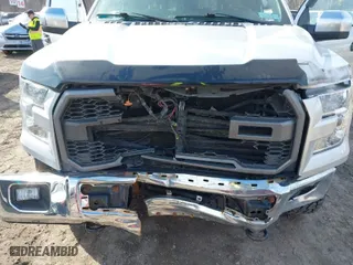 2015 Ford F-150 XLT w/HD Payload Pkg with VIN 1FTFW1EG3FFA42978, listed as a IAAI auction lot 41829308 with 66,642 mi miles. Bid and sale history available at carsss.com. Image 6.