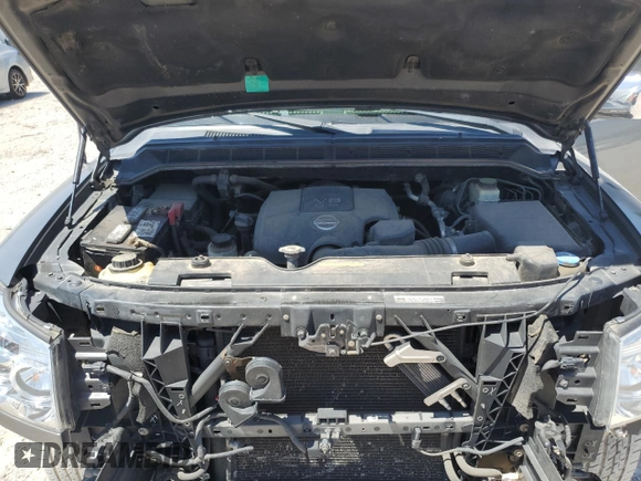2015 Nissan Titan Pro-4X with VIN 1N6BA0EC5FN514184, listed as a Copart auction lot 56721065 with 127,283 mi miles and Salvage title. Bid and sale history available at DreamBid. Image 11.