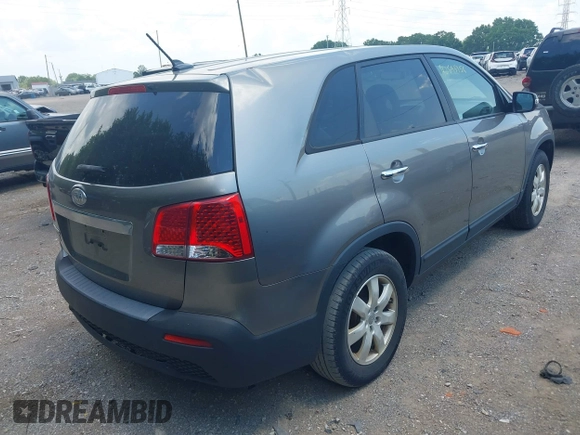 2013 Kia Sorento LX with VIN 5XYKT3A17DG405636, listed as a IAAI auction lot 42595956 with 192,632 mi miles and . Bid and sale history available at DreamBid. Image 4.