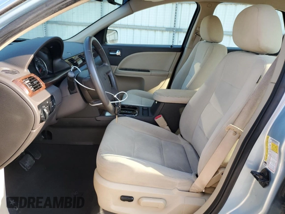 2008 Ford Taurus SEL with VIN 1FAHP24W68G187312, listed as a Copart auction lot 62879765 with 154,706 mi miles and Salvage title. Bid and sale history available at DreamBid. Image 7.