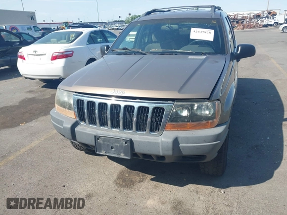 2001 Jeep Grand Cherokee Laredo with VIN 1J4GW48S81C694537, listed as a IAAI auction lot 42447828 with 162,981 mi miles and . Bid and sale history available at DreamBid. Image 6.
