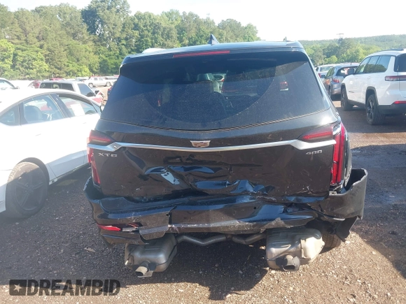 2020 Cadillac XT6 FWD Premium Luxury with VIN 1GYKPCRS0LZ206567, listed as a IAAI auction lot 42254511 with 80,443 mi miles and . Bid and sale history available at DreamBid. Image 17.