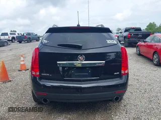 2015 Cadillac SRX Premium Collection z VIN 3GYFNGE36FS626641, wystawiony jako IAAI lot #42532380 z przebiegiem 178 799 mil mil oraz . Historia ofert i sprzedaży dostępna na DreamBid. Obrazek 16.