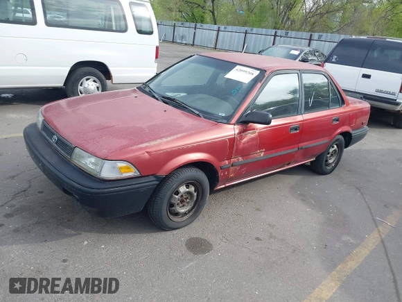 1991 Toyota Corolla z VIN 1NXAE94AXMZ209706, wystawiony jako IAAI lot #42099208 z przebiegiem 192 222 mil mil oraz . Historia ofert i sprzedaży dostępna na DreamBid. Obrazek 2.