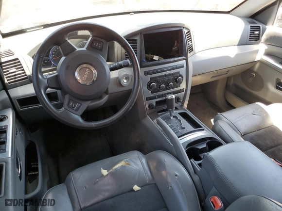 2007 Jeep Grand Cherokee SRT-8 with VIN 1J8HR78387C603473, listed as a Copart auction lot 57712964 with 114,429 mi miles and Salvage Title. Bid and sale history available at carsss.com. Image 8.