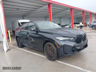 2025 BMW X6 M60i with VIN 5UX43EX0XS9W73189, listed as a IAAI auction lot 39897509 with 1,170 mi miles. Bid and sale history available at carsss.com. Image 1.
