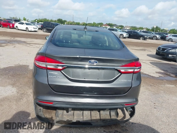 2017 Ford Fusion Hybrid SE with VIN 3FA6P0LU5HR336779, listed as a IAAI auction lot 42691789 with 140,720 mi miles and . Bid and sale history available at DreamBid. Image 16.