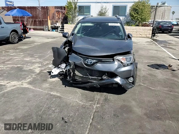 2018 Toyota RAV4 XLE with VIN JTMRFREVXJD251679, listed as a Copart auction lot 49454115 with 48,385 mi miles and Salvage Title. Bid and sale history available at DreamBid. Image 11.