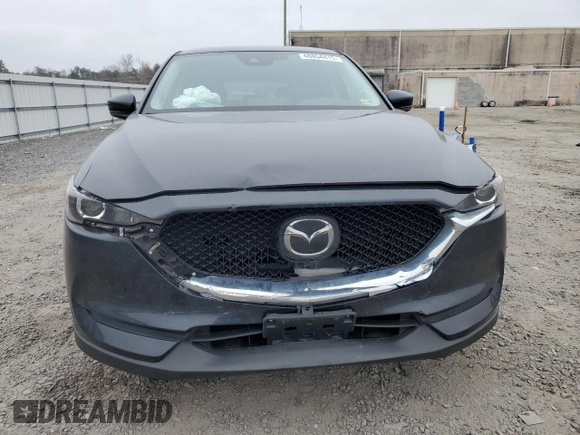 2021 Mazda CX-5 Touring with VIN JM3KFBCM7M1480336, listed as a Copart auction lot 48854415 with 51,774 mi miles and Salvage Title. Bid and sale history available at carsss.com. Image 5.