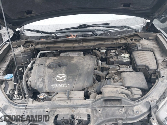 2016 Mazda CX-5 Grand Touring z VIN JM3KE4DY5G0742686, wystawiony jako IAAI lot #41598719 z przebiegiem 117 643 mil mil oraz . Historia ofert i sprzedaży dostępna na DreamBid. Obrazek 10.