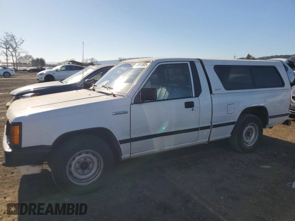 1990 Mitsubishi Mighty Max z VIN JA7FL24W3LP007688, wystawiony jako Copart lot #42651005 z przebiegiem 265 379 mil mil oraz Tytuł czysty. Historia ofert i sprzedaży dostępna na DreamBid. Obrazek 1.