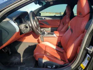 2022 BMW M8 Competition z VIN WBSGV0C08NCH18537, wystawiony jako Copart lot #50767325 z przebiegiem 46 180 mil mil oraz Tytuł czysty. Historia ofert i sprzedaży dostępna na DreamBid. Obrazek 7.