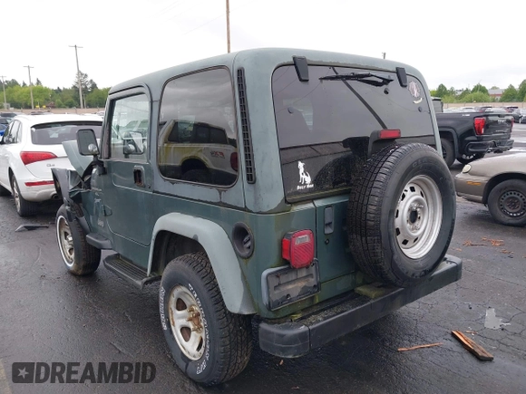 1999 Jeep Wrangler Sport with VIN 1J4FY19S6XP428003, listed as a IAAI auction lot 42149234 with 1 mi miles. Bid and sale history available at carsss.com. Image 3.