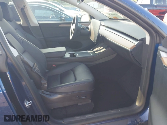 2023 Tesla Model Y Long Range with VIN 7SAYGDEE0PF671726, listed as a IAAI auction lot 42393616 with Not provided miles and . Bid and sale history available at DreamBid. Image 5.