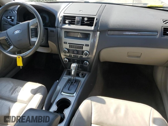 2012 Ford Fusion SEL z VIN 3FAHP0JAXCR220259, wystawiony jako Copart lot #53913975 z przebiegiem 145 424 mil mil oraz Szkoda całkowita • Salvage title. Historia ofert i sprzedaży dostępna na DreamBid. Obrazek 8.