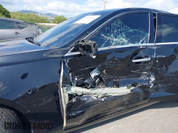 2016 Cadillac CTS Sedan Luxury Collection RWD with VIN 1G6AR5SX8G0167026, listed as a IAAI auction lot 41526996 with 76,612 mi miles. Bid and sale history available at carsss.com. Image 6.