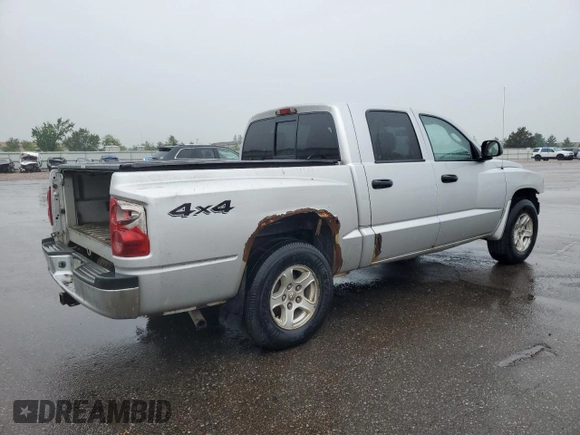 2005 Dodge Dakota SLT z VIN 1D7HW48N45S253901, wystawiony jako Copart lot #59167695 z przebiegiem 134 353 mil mil oraz Czysty tytuł • Clean title. Historia ofert i sprzedaży dostępna na DreamBid. Obrazek 3.
