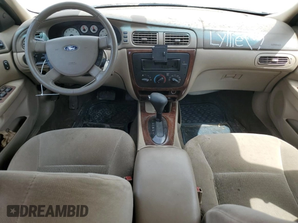 2007 Ford Taurus SEL with VIN 1FAFP56U97A177718, listed as a Copart auction lot 58003135 with 122,079 mi miles and Salvage title. Bid and sale history available at DreamBid. Image 8.