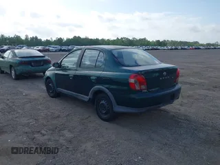 2000 Toyota ECHO z VIN JTDBT1234Y0008904, wystawiony jako IAAI lot #41998668 z przebiegiem 296 735 mil mil oraz . Historia ofert i sprzedaży dostępna na DreamBid. Obrazek 3.