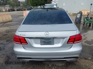 2014 Mercedes-Benz E with VIN WDDHF5KB8EB009303, listed as a IAAI auction lot 42014846 with 97,214 mi miles. Bid and sale history available at carsss.com. Image 16.