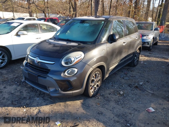 2014 FIAT 500L Trekking with VIN ZFBCFADHXEZ018139, listed as a IAAI auction lot 41224953 with 175,727 mi miles and . Bid and sale history available at DreamBid. Image 2.