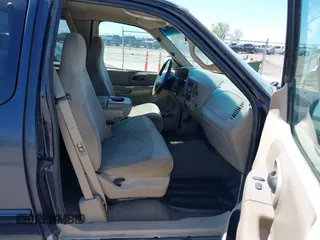 2000 Ford F-150 XL with VIN 1FTRX18LXYNB41132, listed as a IAAI auction lot 42173717 with Not provided miles and . Bid and sale history available at DreamBid. Image 5.