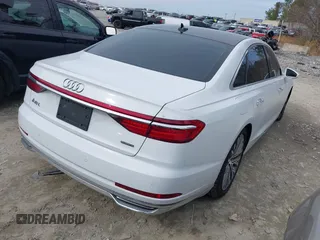 2019 Audi A8 L with VIN WAU8DAF83KN007358, listed as a IAAI auction lot 41540352 with 77,203 mi miles. Bid and sale history available at carsss.com. Image 4.