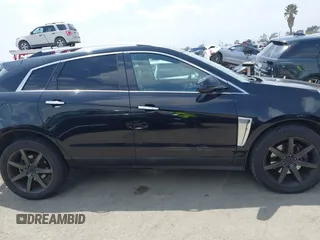 2014 Cadillac SRX Luxury Collection with VIN 3GYFNBE34ES639647, listed as a IAAI auction lot 42108140 with 99,740 mi miles and . Bid and sale history available at DreamBid. Image 14.