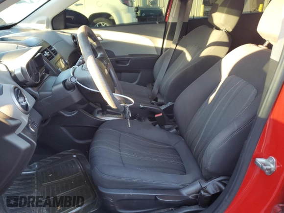 2012 Chevrolet Sonic LT with VIN 1G1JC6SB4C4221295, listed as a Copart auction lot 81294604 with 158,597 mi miles and Salvage title. Bid and sale history available at DreamBid. Image 7.