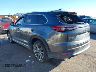 2023 Mazda CX-9 Signature z VIN JM3TCBEY1P0634465, wystawiony jako IAAI lot #41400230 z przebiegiem 42 166 mil mil oraz . Historia ofert i sprzedaży dostępna na DreamBid. Obrazek 3.