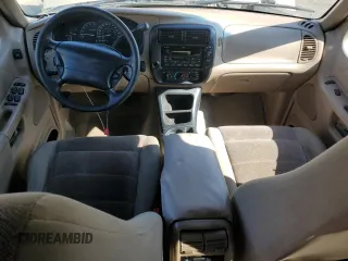 2000 Ford Explorer XLT z VIN 1FMDU83P1YZC26628, wystawiony jako Copart lot #69201664 z przebiegiem 219 384 mil mil oraz Nie do naprawy • Non repairable. Historia ofert i sprzedaży dostępna na DreamBid. Obrazek 8.