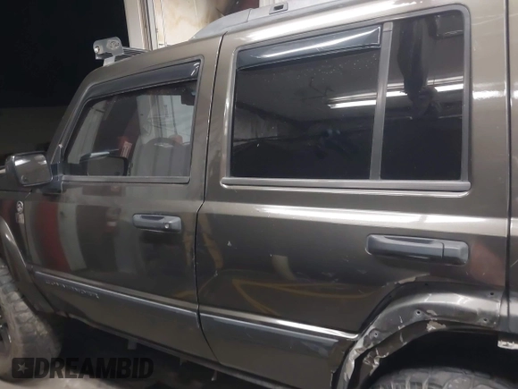 2006 Jeep Commander with VIN 1J8HG48KX6C263348, listed as a IAAI auction lot 42128039 with 208,605 mi miles and . Bid and sale history available at DreamBid. Image 15.