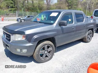 2009 Honda Ridgeline RTL with VIN 2HJYK16539H503533, listed as a IAAI auction lot 42040423 with 206,102 mi miles and . Bid and sale history available at DreamBid. Image 2.