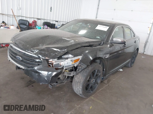 2013 Ford Taurus Limited z VIN 1FAHP2F80DG206445, wystawiony jako IAAI lot #42275040 z przebiegiem 240 502 mil mil oraz . Historia ofert i sprzedaży dostępna na DreamBid. Obrazek 16.