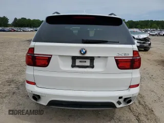 2013 BMW X5 xDrive35i z VIN 5UXZV4C59D0B21124, wystawiony jako Copart lot #57881665 z przebiegiem 41 277 mil mil oraz Tytuł czysty. Historia ofert i sprzedaży dostępna na DreamBid. Obrazek 6.