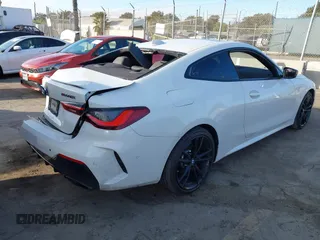 2021 BMW 4 Series M440i xDrive with VIN WBA13AR09MCF64044, listed as a IAAI auction lot 41391508 with 29,007 mi miles and . Bid and sale history available at DreamBid. Image 4.
