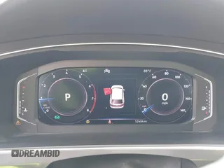 2020 Volkswagen Tiguan SE z VIN 3VV3B7AX4LM032609, wystawiony jako IAAI lot #42074359 z przebiegiem 52 404 mil mil oraz . Historia ofert i sprzedaży dostępna na DreamBid. Obrazek 7.