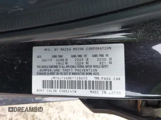 2014 Mazda Mazda6 i Touring with VIN JM1GJ1V68E1128650, listed as a IAAI auction lot 42035713 with 171,609 mi miles. Bid and sale history available at carsss.com. Image 9.