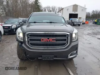 2019 GMC Yukon SLE with VIN 1GKS2AKC1KR385085, listed as a IAAI auction lot 41699370 with 83,889 mi miles. Bid and sale history available at carsss.com. Image 12.