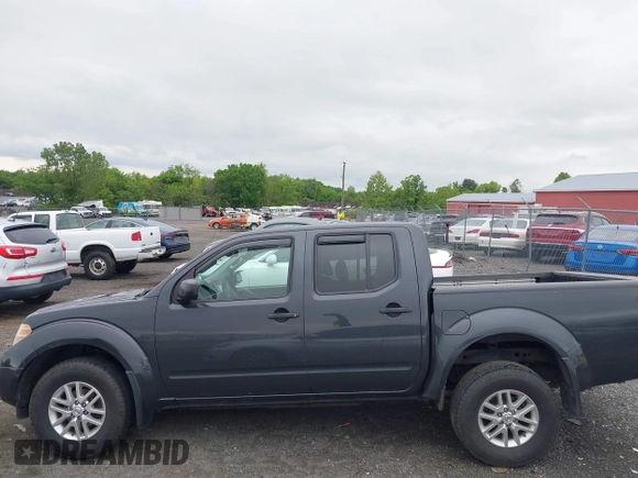 2015 Nissan Frontier SV z VIN 1N6AD0EV6FN715810, wystawiony jako IAAI lot #42199101 z przebiegiem 134 982 mil mil oraz . Historia ofert i sprzedaży dostępna na DreamBid. Obrazek 14.