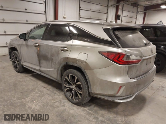2018 Lexus RX 350L Premium z VIN JTJDZKCA6J2004385, wystawiony jako IAAI lot #41382429 z przebiegiem 111 638 mil mil oraz . Historia ofert i sprzedaży dostępna na DreamBid. Obrazek 3.
