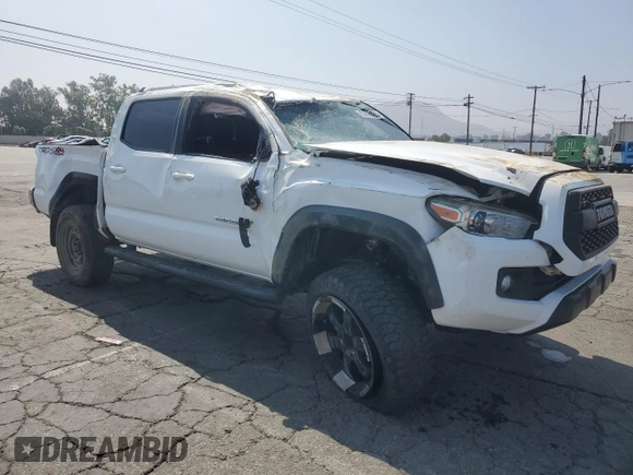 2017 Toyota Tacoma SR5 with VIN 3TMCZ5AN7HM065026, listed as a Copart auction lot 60438365 with 122,329 mi miles and Salvage title. Bid and sale history available at DreamBid. Image 4.