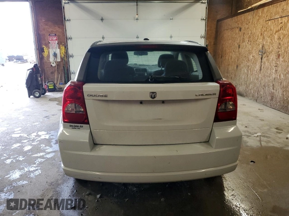2011 Dodge Caliber Heat z VIN 1B3CB5HA6BD222153, wystawiony jako Copart lot #56881205 z przebiegiem 153 950 mil mil oraz Szkody całkowita. Historia ofert i sprzedaży dostępna na DreamBid. Obrazek 6.
