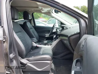 2013 Ford Escape SEL z VIN 1FMCU0H96DUC33699, wystawiony jako IAAI lot #42779073 z przebiegiem 120 992 mil mil oraz . Historia ofert i sprzedaży dostępna na DreamBid. Obrazek 5.